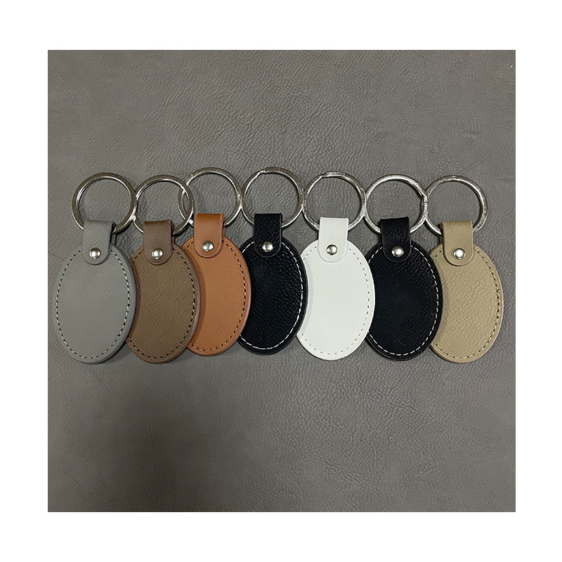 พวงกุญแจวงรีหนังเทียมแบบ Laserable พร้อมขอบทาน้ำมัน
